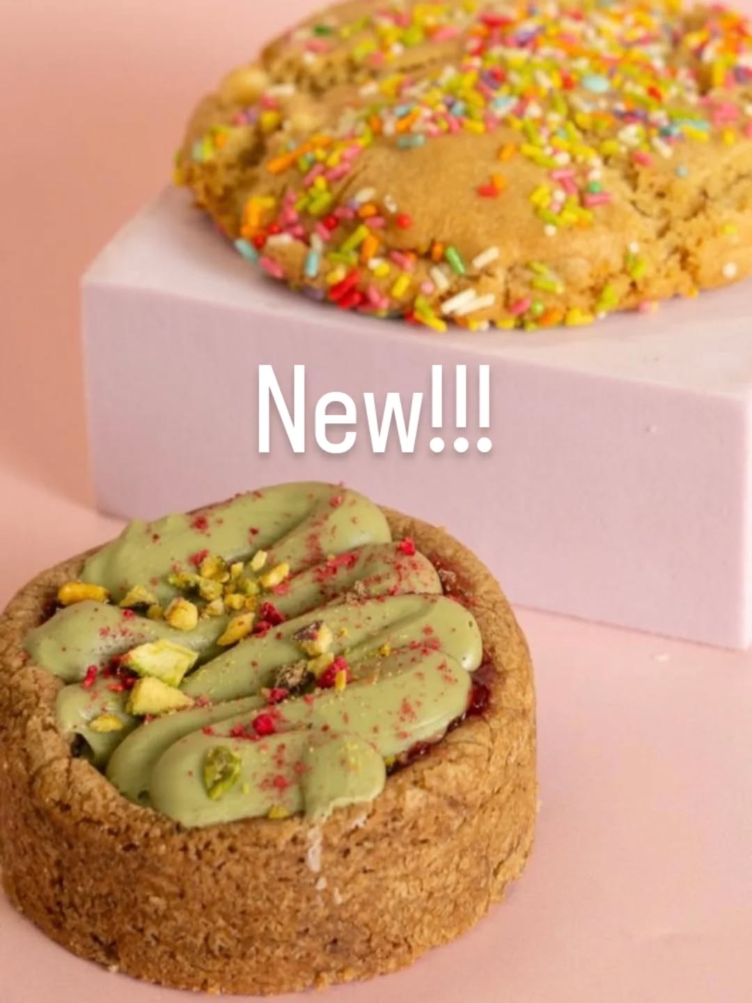 Pistachio deep dish tart and a funfetti cookie against a pink background.